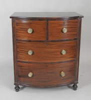 Lot 906 - A William IV mahogany bow front chest of two...