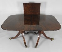 Lot 907 - A Regency style mahogany twin pillar dining...