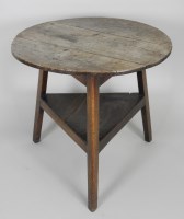 Lot 914 - A George III oak and elm cricket table the...