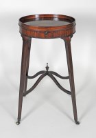 Lot 920 - A George III mahogany urn table, the oval...