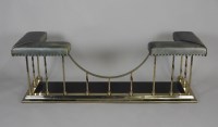 Lot 922 - A modern lacquered brass and metal club fender,...