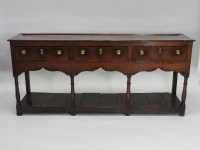 Lot 925 - A George III oak Montgomery three drawer...