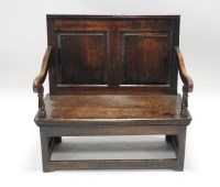 Lot 927 - A joined oak two panel settle, elements 18th...