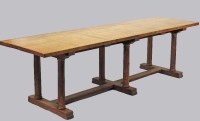 Lot 960 - A Gordon Russell oak refectory table, the...