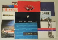 Lot 973 - A collection of 24 original car brochures...