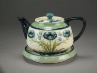 Lot 47 - A Moorcroft Macintyre Florian ware teapot,...