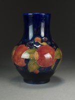 Lot 59 - A Moorcroft vase in Pomegranate pattern...