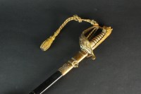 Lot 77 - A George VI Naval Officers' sword with a...