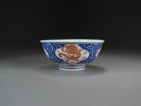 Lot 110 - A Chinese blue and white and iron red bowl,...