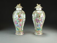 Lot 121 - A pair of Chinese Canton famille rose vases...