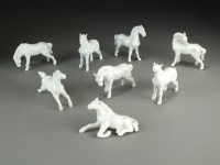 Lot 144 - A set of eight Chinese blanc de chine horses...