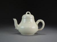 Lot 145 - A Chinese creamy-white crackle glazed soft...