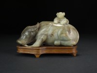 Lot 159 - A Chinese grey-green jade carving of a water...