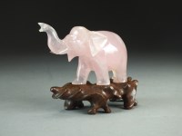 Lot 160 - A Chinese rose quartz figure of an elephant,...