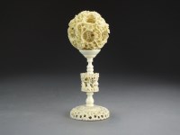 Lot 186 - A Chinese Canton carved ivory puzzle ball on...