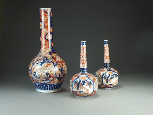 Lot 200 - A pair of Japanese Imari bottle vases,...