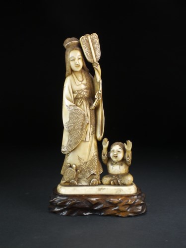 Lot 209 - A Japanese ivory figure group of Benzaiten and...