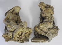 Lot 294 - A pair of plaster figural wall appliques in...
