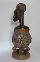 Lot 335 - A carved wooden grain storage pot and lid of...