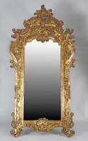 Lot 366 - A modern Rococo style pier mirror, giltwood...