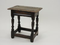 Lot 381 - A 17th century and later joined oak stool, the...