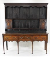 Lot 403 - A George III oak high dresser, Shropshire, the...