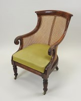 Lot 404 - A Victorian mahogany bergere armchair with bar...