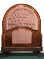 Lot 421 - A Victorian figured walnut bedstead with...