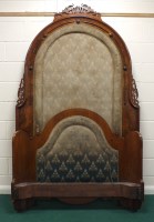 Lot 422 - A Victorian figured walnut bedstead with...