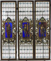 Lot 434 - A set of three framed full height leaded glass...