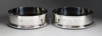 Lot 94 - A pair of silver mounted wine coasters, A & Ss...