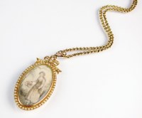 Lot 143 - A split seed pearl mourning pendant, the oval...