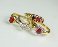 Lot 148 - A seven stone ruby and diamond ring, together...