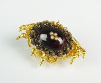 Lot 149 - A 19th century garnet and seed pearl filigree...
