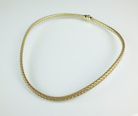 Lot 161 - A 9ct yellow gold stylised plait collarette,...