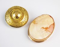 Lot 172 - A Victorian yellow metal locket brooch, with...