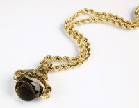 Lot 175 - A yellow metal rope twist chain with lobster...
