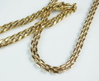 Lot 178 - A 9ct yellow gold flat curb link bracelet,...