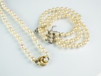 Lot 186 - A single strand cultured pearl necklace, the...
