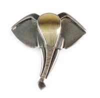 Lot 194 - A stylised Elephant brooch, the plain polished...