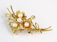 Lot 195 - An 18ct gold pearl set floral spray brooch,...