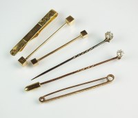 Lot 197 - A diamond set stick pin, together with a 9ct...