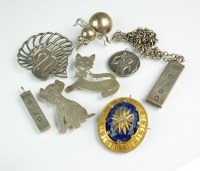 Lot 203 - Two silver ingot pendants, together with four...