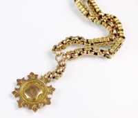 Lot 205 - A 9ct gold fob, suspended from decorative...
