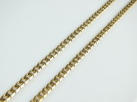 Lot 207 - A 9ct gold flat curb link chain, with lobster...