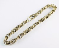 Lot 212 - A 9ct yellow gold decorative link bracelet,...