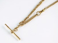 Lot 213 - A 9ct rose gold graduated curb link albert,...