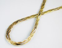 Lot 214 - A yellow and white metal plaited necklace,...