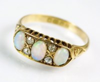 Lot 220 - An early 20th century 18ct gold seven stone...