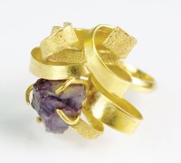 Lot 223 - A rough amethyst set dress ring, designed as a...